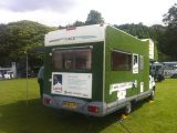 Grassed up motorhome loving outdoors