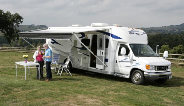 2006 Coachmen Concord 275 DS - front three-quarters view, awning extended
