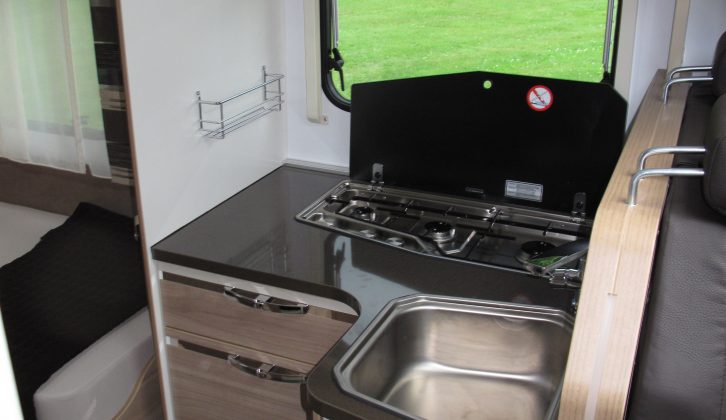 The 2014 Adria Coral Acess has a compact mid-ships kitchen.