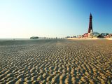 Blackpool Tower and beach are great for visitors of all ages on their holidays in North West England