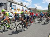 Finally, the peloton streams through Kettlewell in North Yorkshire