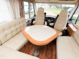 There's a clever, movable table in this German built luxury motorhome