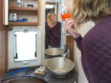 The Practical Motorhome review team loved the grey marble-effect worktop and the illuminated half-length mirror in the Chausson Welcome 717's washroom