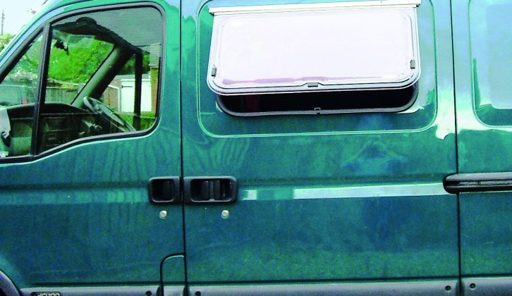 Two side windows, two rear windows and a rooflight were fitted to this former delivery van as part of its transformation into a campervan