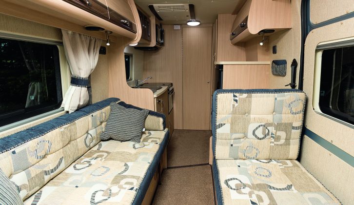 There's room for six to sit, or four to dine in the Lounge in the Auto-Sleepers Kemerton XL, when you swivel the two cab seats round to face the sofa