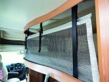 Practical Motorhome's reviewers praised the big safety net to stop people falling out of the drop-down bed – smaller occupants might need a hand getting out, though
