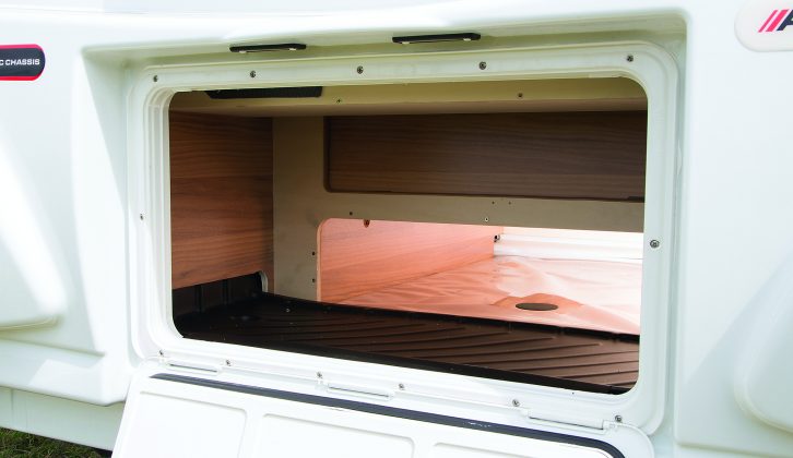 The storage under the rear lounge is accessible from outside the ’van, thanks to this smart locker door fitted to the back panel of the Bailey Approach Autograph 765