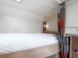 Both fixed bunks are a generous size and comfortable – each has a reading light and a curtain shuts the area off at night