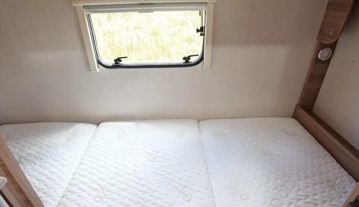 The 1.62m x 0.74m lower bunk folds up to provide storage space – read more in the Practical Motorhome Swift Escape 696 review