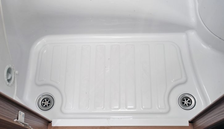 Water can drain away even if you've pitched on a slope, as there are two plug holes in the Swift Escape 696's shower tray