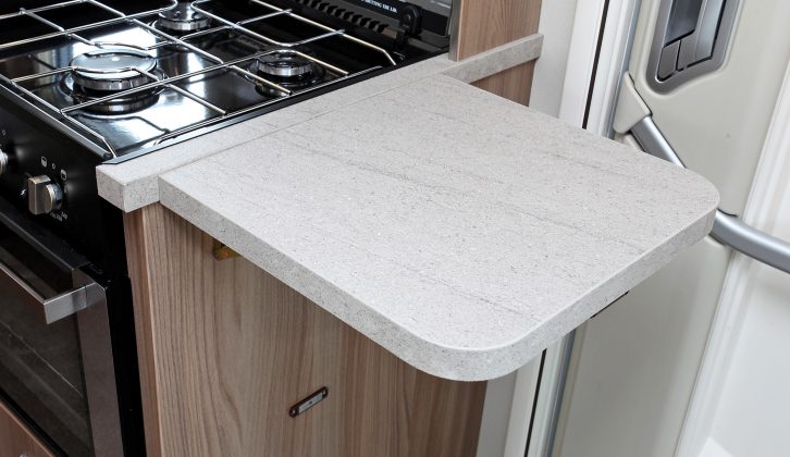 A flip-up worktop extension allows extra preparation space for motorcaravanning cooks, but care should be taken with people using the entrance door