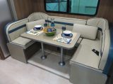 There is a spacious sitting and dining area in this Stateside motorhome