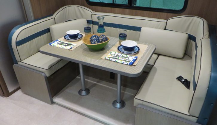 There is a spacious sitting and dining area in this Stateside motorhome