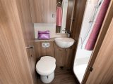 There's a lot of wood in the Esprit 494's washroom, and plenty of space, too. The separate shower area will be popular with many potential buyers