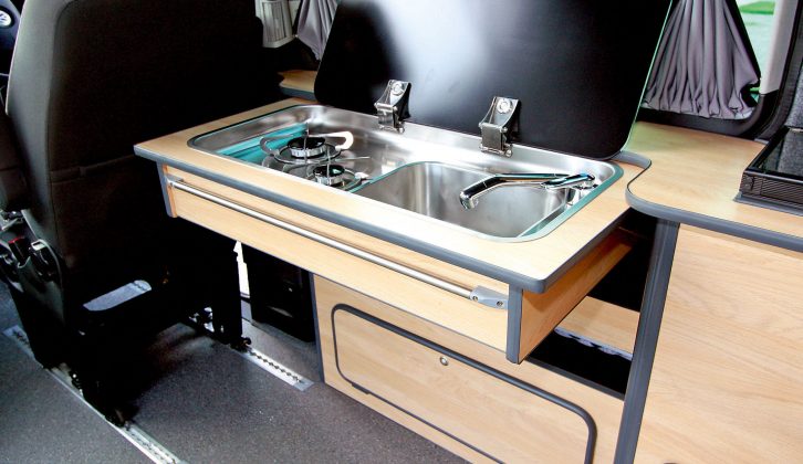 Kitchen worktops are balcony ones so that the wheelchair user doesn't have to sit side-saddle to prepare food in the GM Coachwork Panorama camper