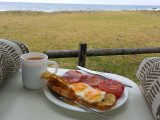 Eating a tasty breakfast with this view, while the surf pounds the beach, was a fabulous start to the day for our motorcaravanning novices in Australia