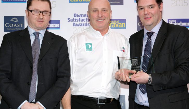 Swift's Nick Page (centre) collected the brand's best pre-owned 'vans prize from Robert Tuke of Coast (right) and Practical Motorhome's Niall Hampton