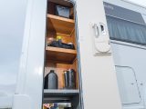 There's a vertical storage locker above the under-floor compartment in this Esprit – the shelves can be removed to store tall items like skis