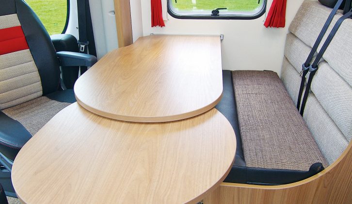Two can dine in comfort in the front half-dinette and a table extension allows up to four to dine in the Bailey Approach Advance 615