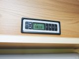 There's a simple LCD display control panel above the motorhome's habitation door so you can select mains lights, water pump and the awning light as soon as you step inside the motorhome