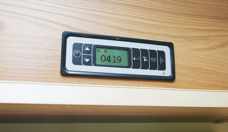 There's a simple LCD display control panel above the motorhome's habitation door so you can select mains lights, water pump and the awning light as soon as you step inside the motorhome