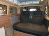 The RIB rear seat bench provides two travel seats, while storage space is available underneath, and in the kitchen unit of the Dalbury E camper