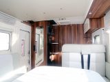 Clever design makes the most of the space in thie sub-6m long T-Line 590 motorhome. Two belted seats in the lounge double as a sofa during the day. They and the two swivelling front cab seats provide space for four people to dine around the sliding tabletop in comfort
