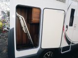 The Roller Team T-Line 590 motorhome has a large offside garage which is home to the ladder that goes with the drop-down bed. There's space inside the garage for plenty more kit