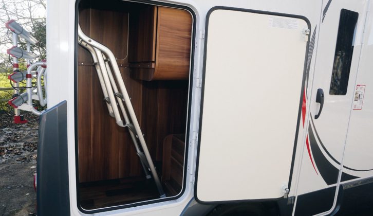 The Roller Team T-Line 590 motorhome has a large offside garage which is home to the ladder that goes with the drop-down bed. There's space inside the garage for plenty more kit