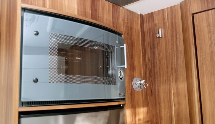 A combined oven/grill sits above a 175-litre fridge that boasts a separate freezer compartment – it's more than enough for a couple on holiday in the Roller Team T-Line 590 motorhome