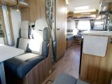 The walkthrough between the galley and the washroom in the Bessacarr Hi-Style 496 is less of a corridor than on similar models. A curtain pulls across to screen the front from the rear at night and there's a worktop flap extension to the right of the kitchen