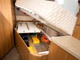 Storage space, with external access, is available under the fixed bed and this is where the folding table is stored, plus the water tank