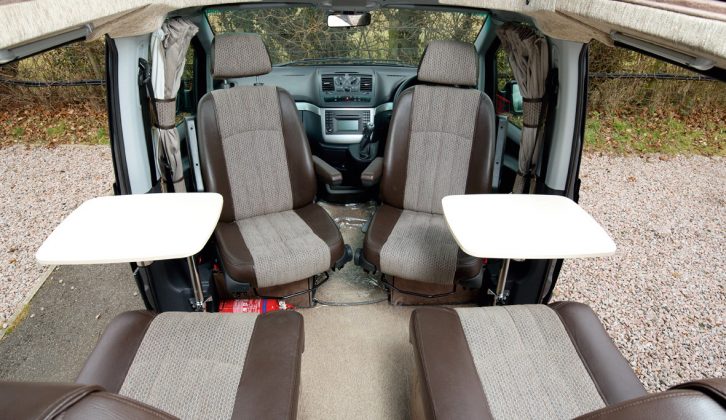 Two substantial travel seats are located next to the sliding doors. Rotate the cab seats and the Auto-Sleeper Wave can fit four in its lounge