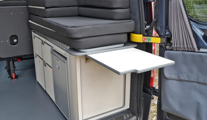 A hinged worktop extension flap encourages al fresco dining; sturdy pouches in the rear doors of the Leisure Van accommodate folding camping chairs