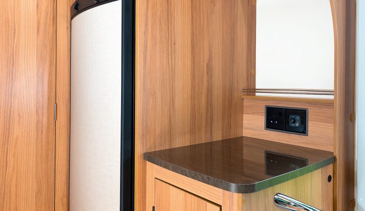 Across the kitchen galley is a huge fridge/freezer with a combined 145l volume. The dresser has a further plug socket and TV aerial point in the Bailey Approach Compact 540