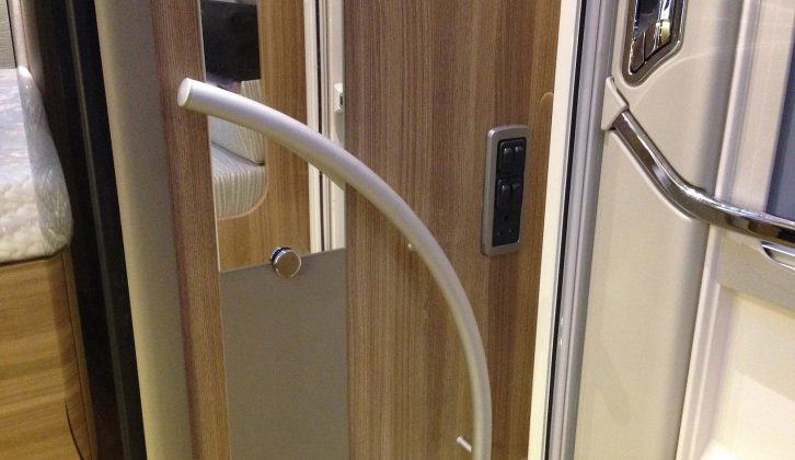A sturdy grab handle on the bulkhead next to the fridge will assist with entering and exiting the Bessacarr 562. Courtesy lights are provided, too