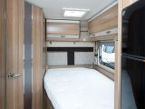 The rear bedroom is well equipped, with a Duvalay mattress, overhead storage and twin reading lights. 
The mattress cutaway is quite pronounced, though