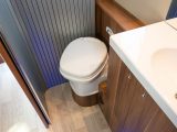 There’s room enough in the 740's compact washroom on the offside of the vehicle – it has decent storage and a swivel cassette toilet offers enough legroom