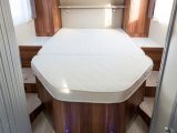 The rear double bed is comfortable and generously proportioned (1.87m x 1.39m) and it splits near the middle to permit easy loading into the storage cavity below