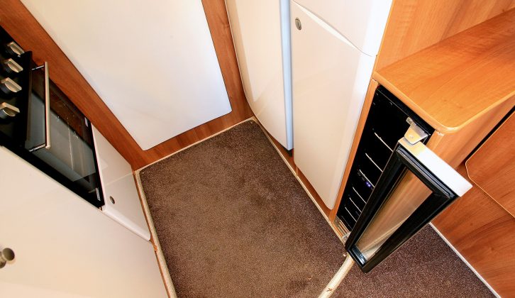 There's a narrow cool cabinet adjacent to wardrobe, which is a 230V wine cooler. Of course, any bottles or cans of soft drinks can be chilled in here as well!
