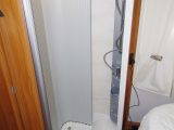 The shower cubicle is amidships on the Dethleffs Esprit T7150 DBM's nearside and has a slight but not significant intrusion from the wheel arch