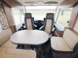 The interior of the Sky i 700 LEG looks classy; all materials used seem of great quality and feel hard-wearing. Swivel the cab chairs and six occupants can sit comfortably in the spacious lounge