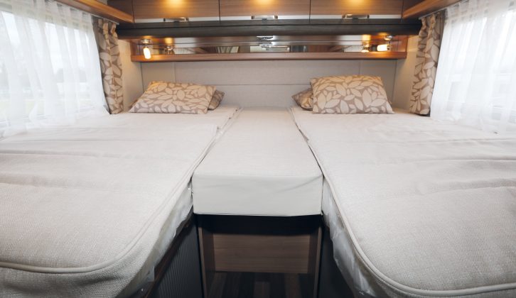 It’s really simple to turn the pair of rear single beds into a comfortable double bed – all you need do is add the infill cushion between them in the rear of the Sky I 700 LEG