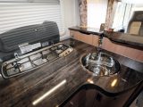 Dark kitchen worktops are practical, while there’s a good amount of work surface and the round sink is nice and deep in the Knaus
