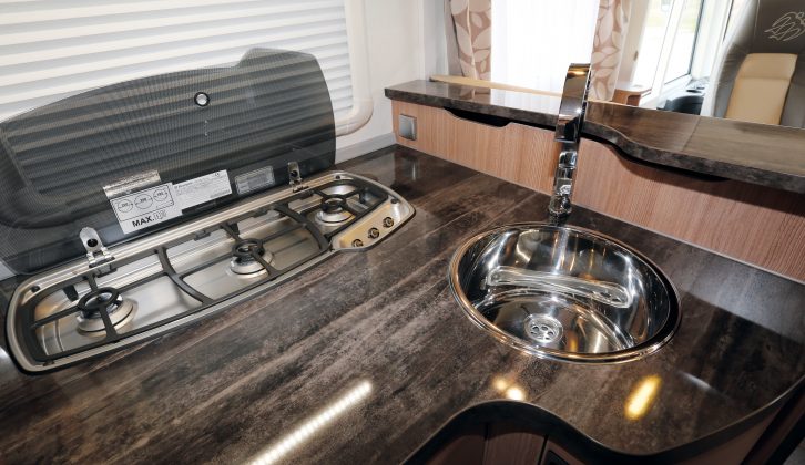 Dark kitchen worktops are practical, while there’s a good amount of work surface and the round sink is nice and deep in the Knaus