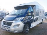 This island-bed low-profile motorhome boasts good looks and space for socialising with friends