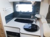 There's a three-burner gas hob, a combi oven and grill, and a circular sink in the P716P's kitchen
