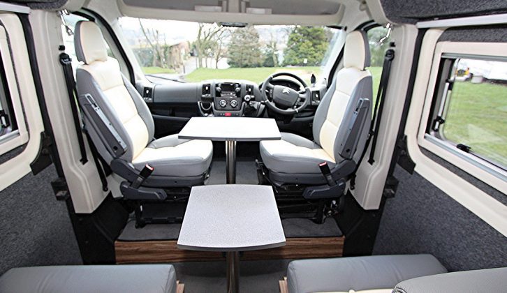 The cab seats are higher than the rear ones, but this isn’t a problem as two island legs and different-sized table tops are included