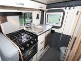 This kitchen will be the envy of many owners of large coachbuilts – note the task lighting spotlamp and the useful work surface
