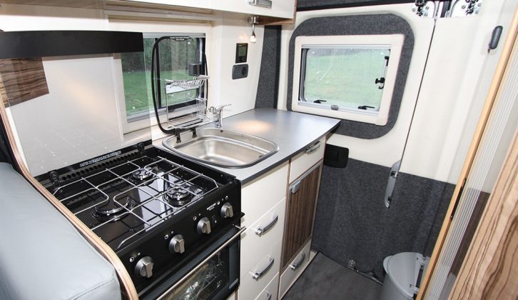 This kitchen will be the envy of many owners of large coachbuilts – note the task lighting spotlamp and the useful work surface